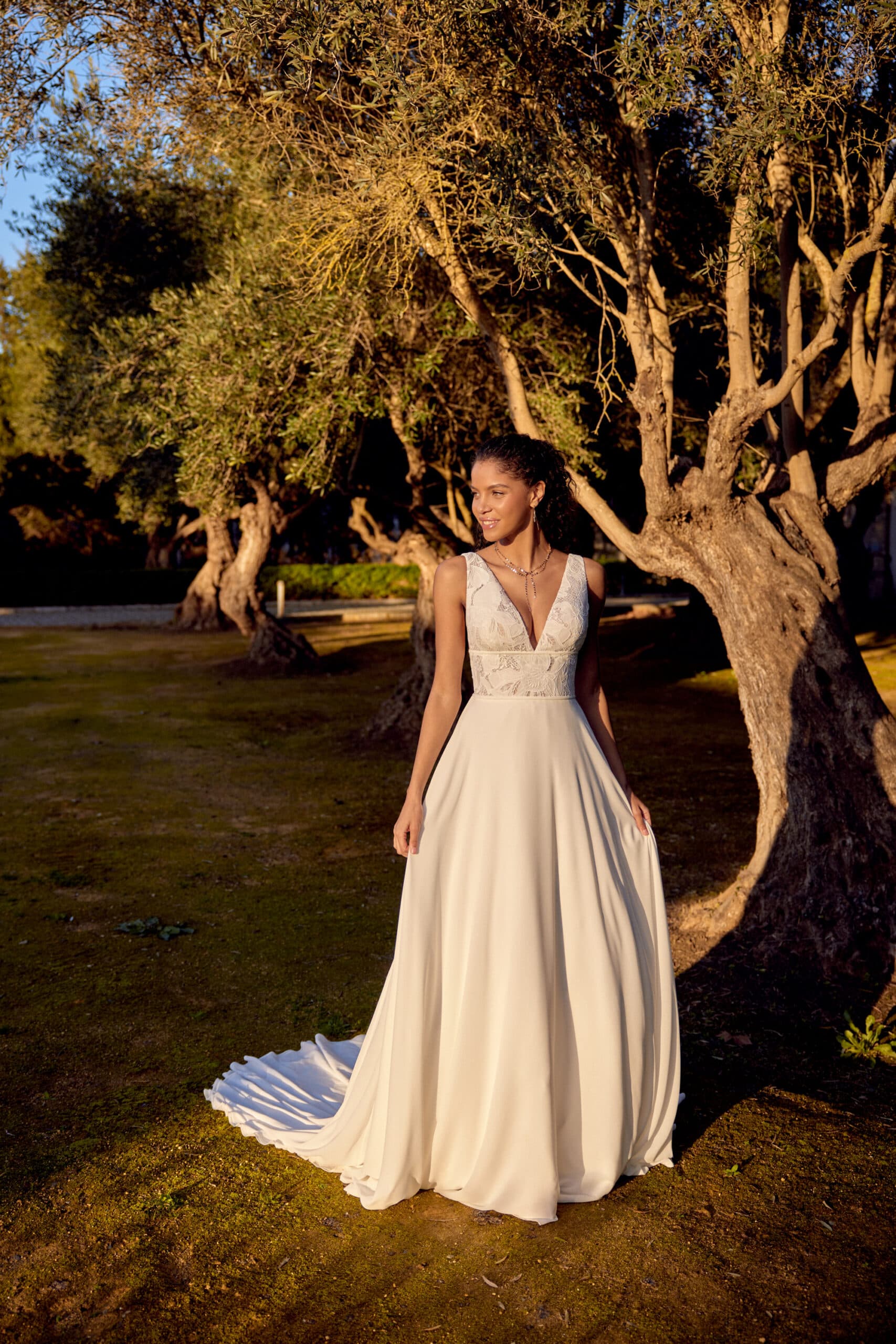 66419- Lillian West wedding dress by Lillian West Chiffon A-line gown with a V-neckline view 1