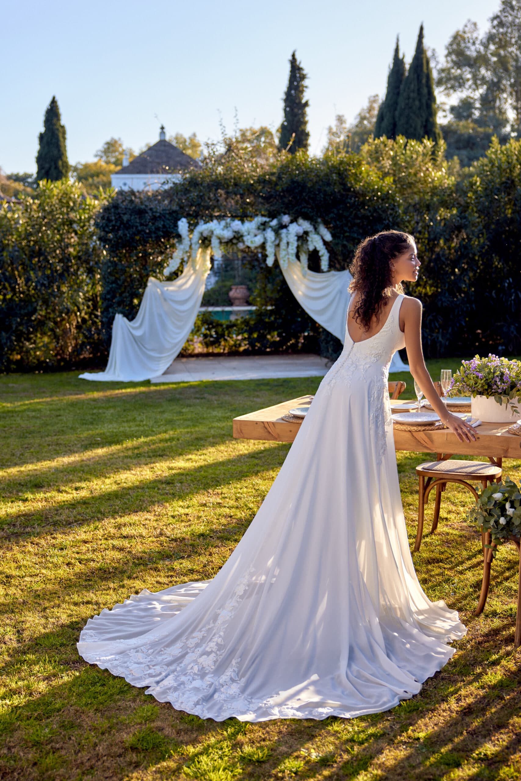 66433 - Lillian West wedding dress by Lillian West Chiffon A-line gown with a plunging V-neckline view 2