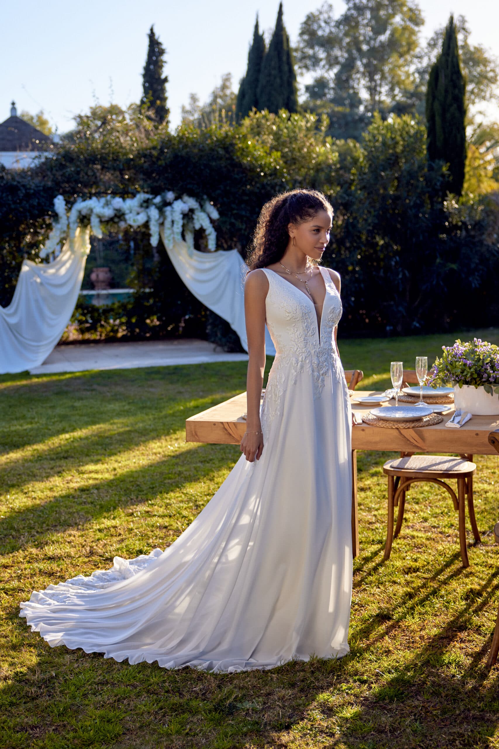 66433 - Lillian West wedding dress by Lillian West Chiffon A-line gown with a plunging V-neckline view 1