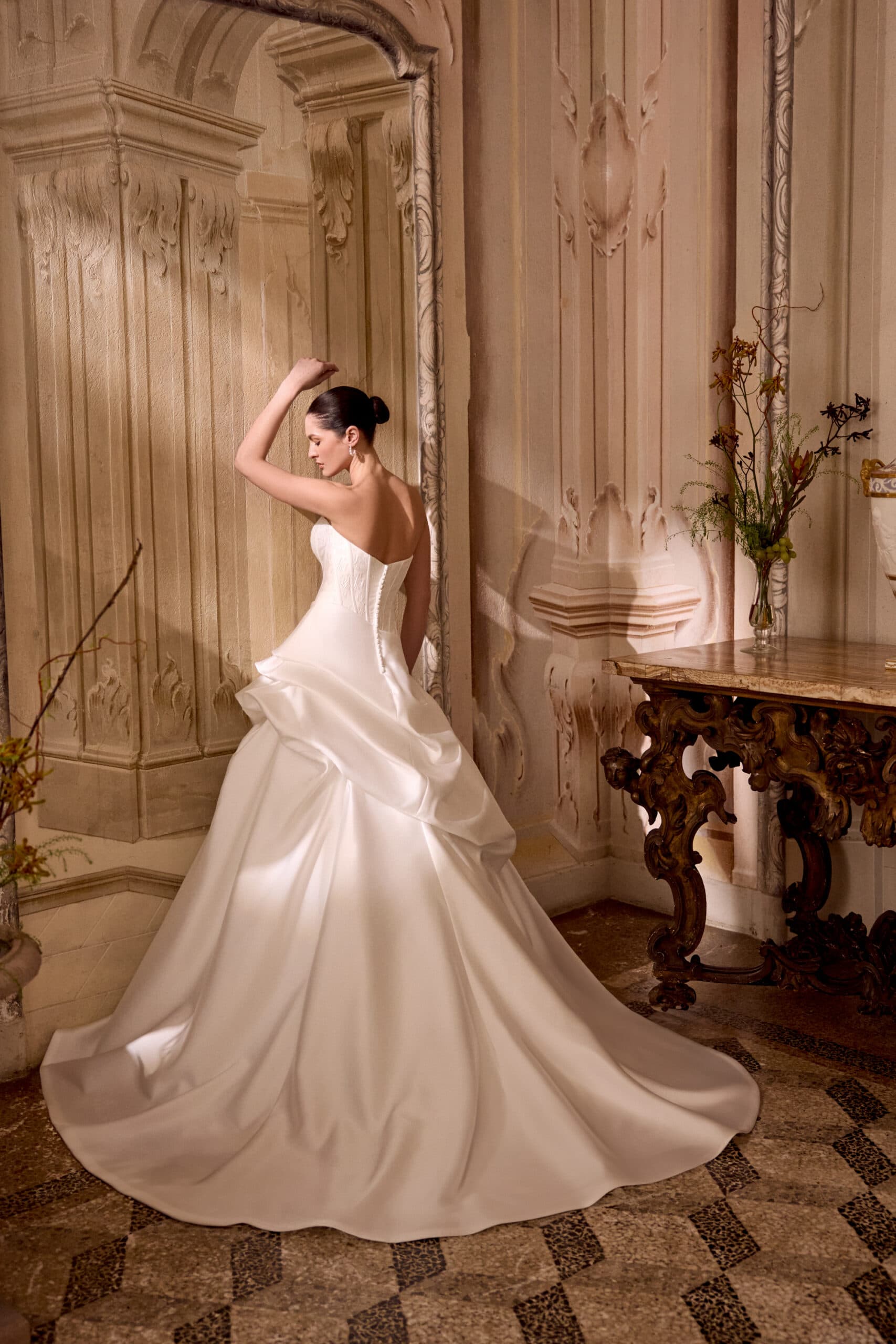 Leizel 88494 - Justin Alexander wedding dress by Justin Alexander - Features a brocade bodice with exposed boning that lea...