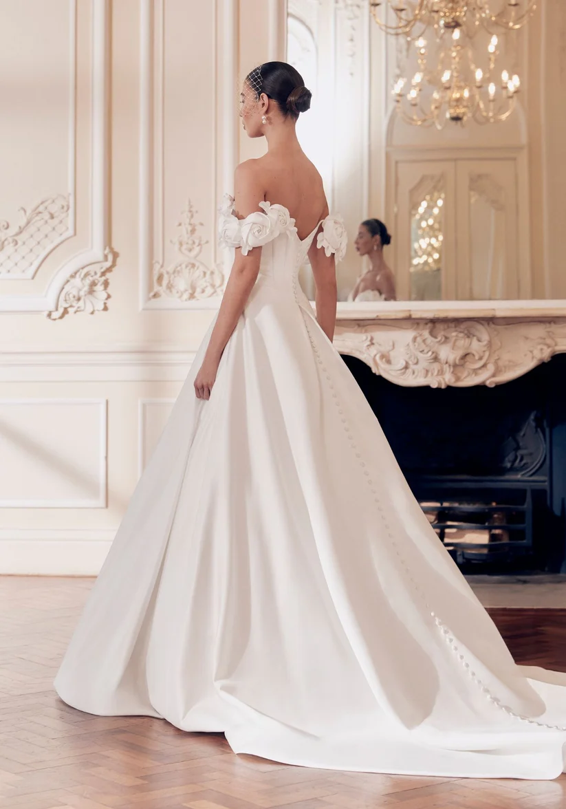 Lucille - Ellis wedding dress by Ellis Bridal Timeless yet whimsical, Lucille sculpts the figure with a co... view 2