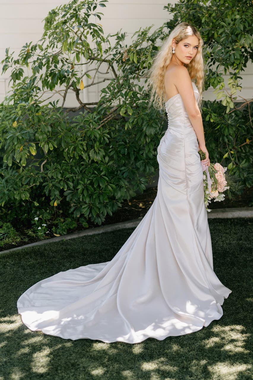 R3911- Allure Romance wedding dress by Allure Romance Sleek and sculpted, this strapless satin gown features a sof... view 2