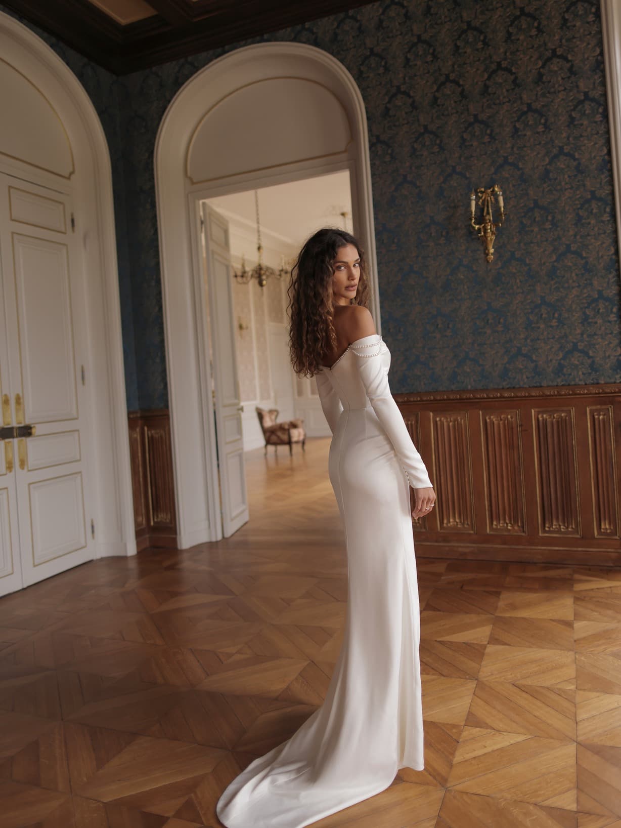 Rios - Wona wedding dress by Wona Concept Sleek gown with a twisted cold-shoulder neckline adorned wit... view 2