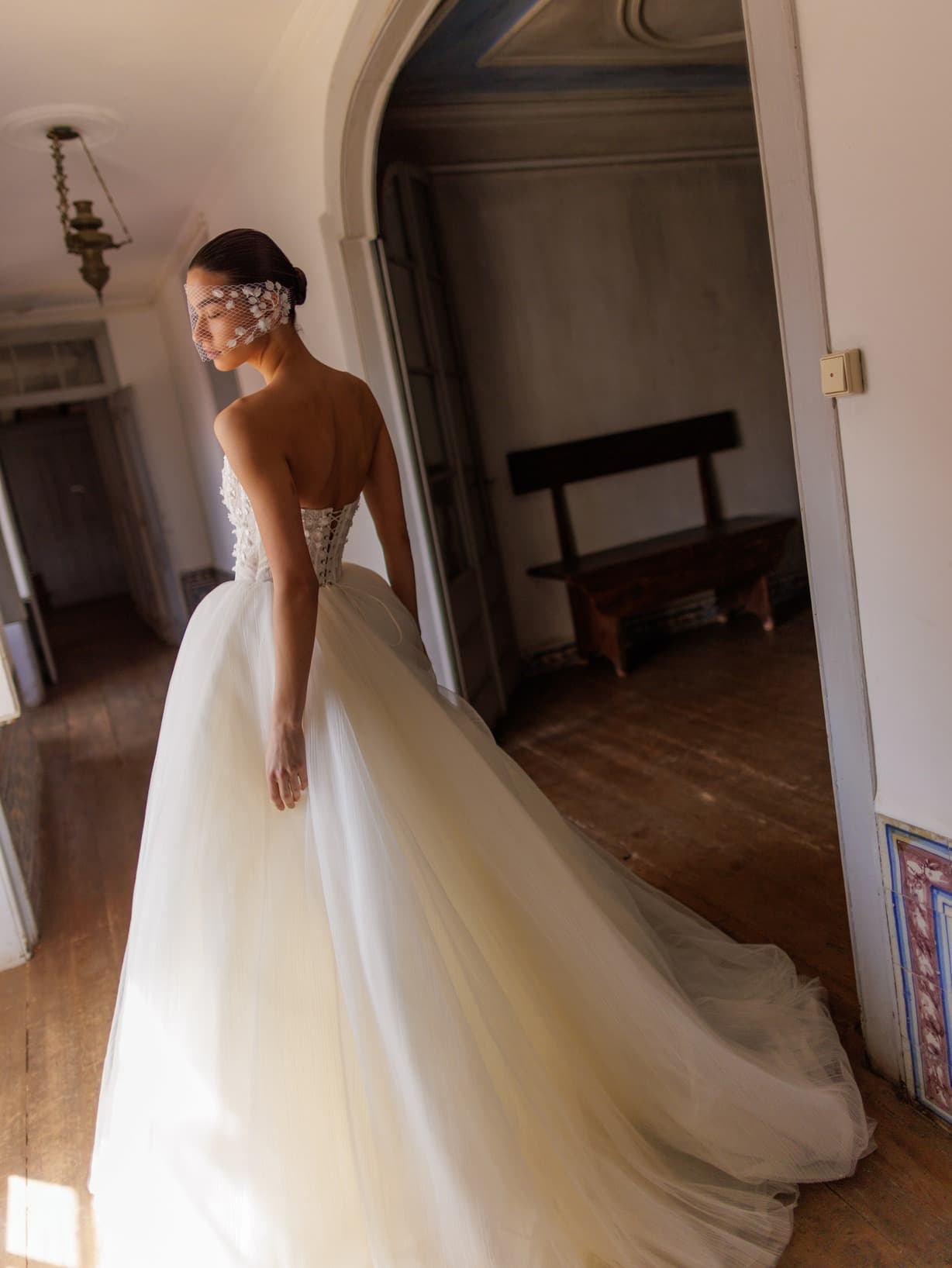 Elite - Wona wedding dress by Wona Concept Swan-like ball gown with fitted corset top adorned by lightw... view 2