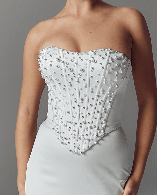 Gloria Bodice - Evie Young wedding dress by Evie Young For brides obsessed with pearls and maximalist bridal looks,...