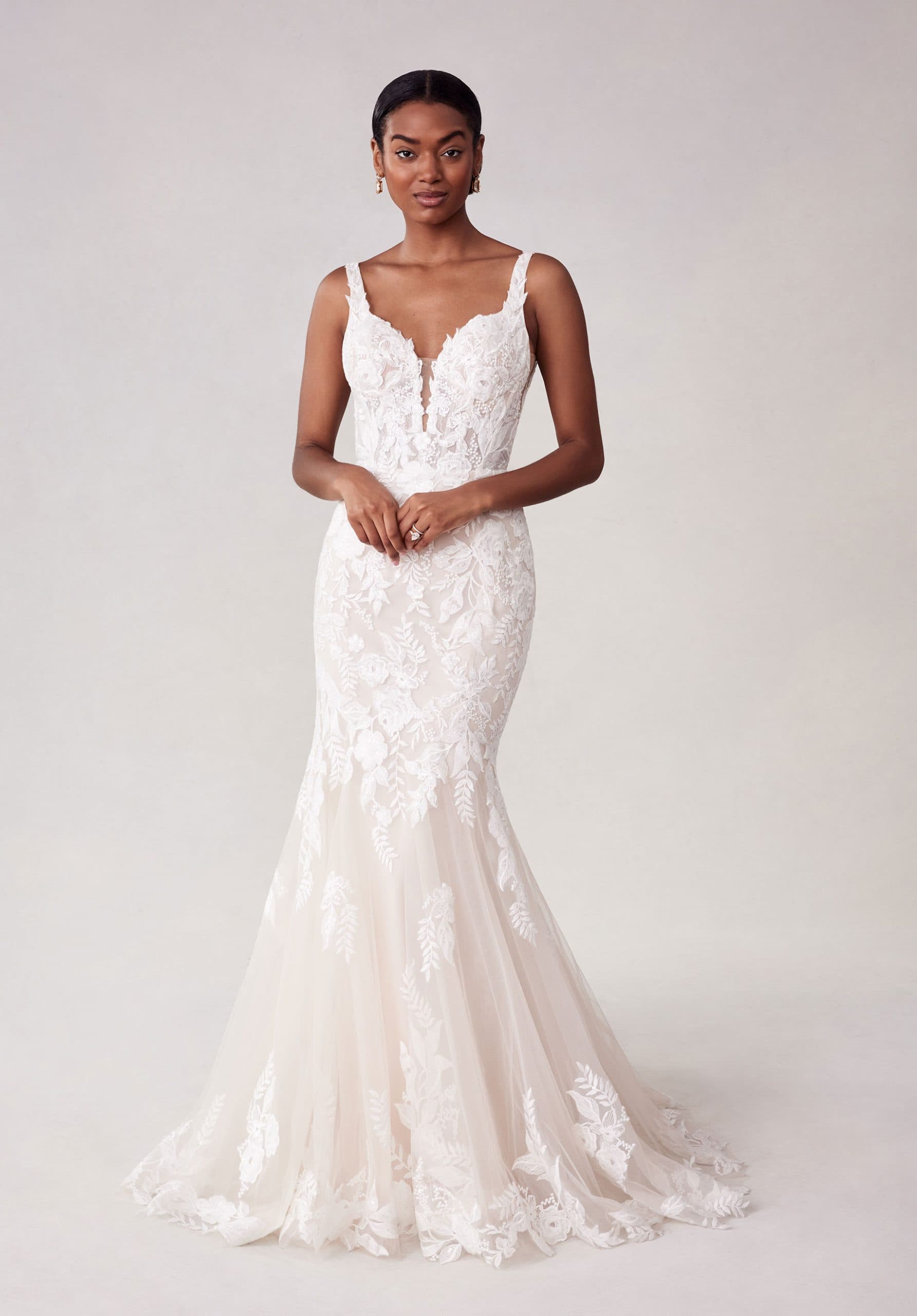 Front view of Morilee Sosie 2738 wedding dress with lace bodice, plunging neckline, and soft tulle skirt