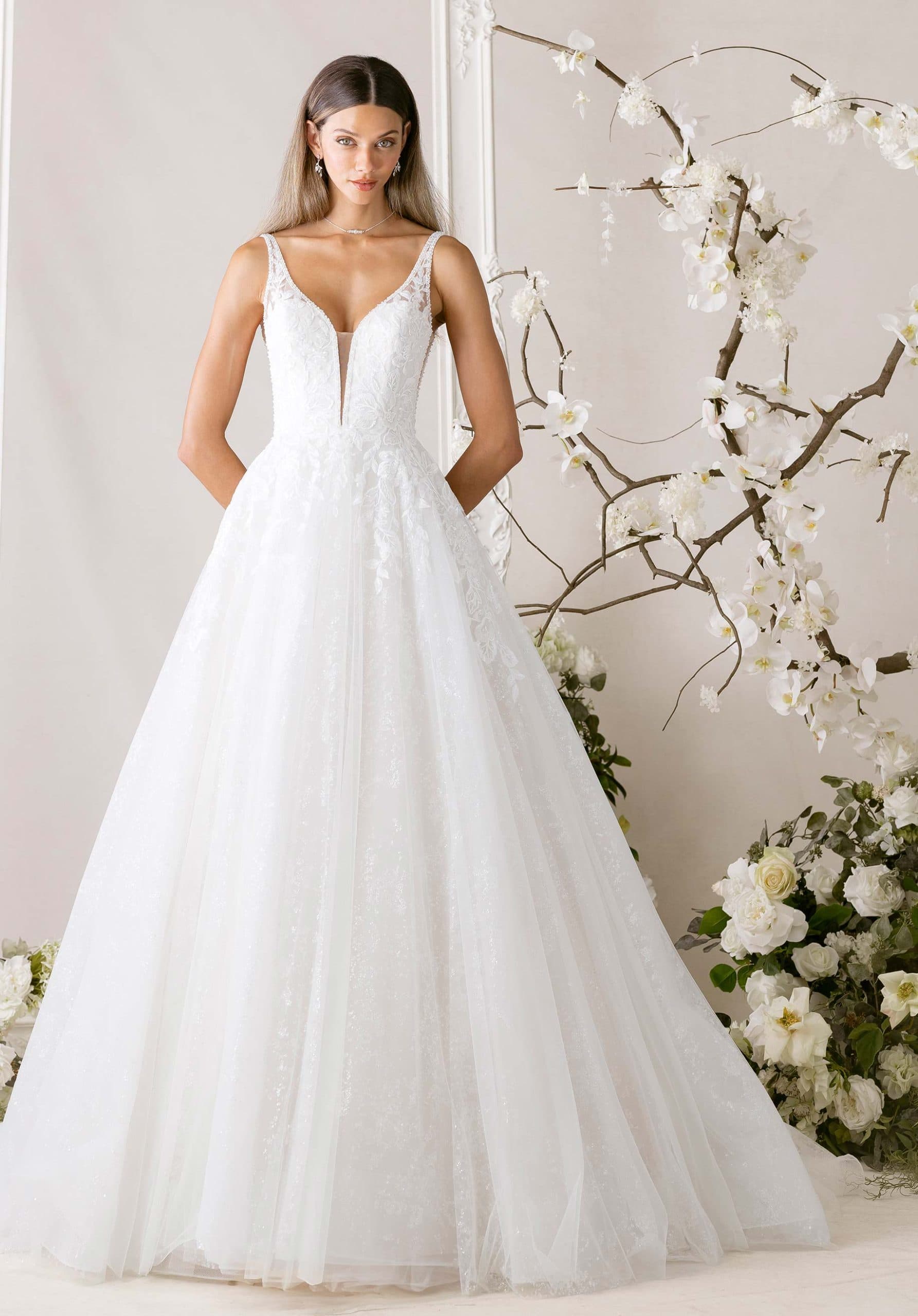 Myrtha - Morilee wedding dress by Morilee Ball gown wedding dress has a plunging v-neckline with strap... view 1