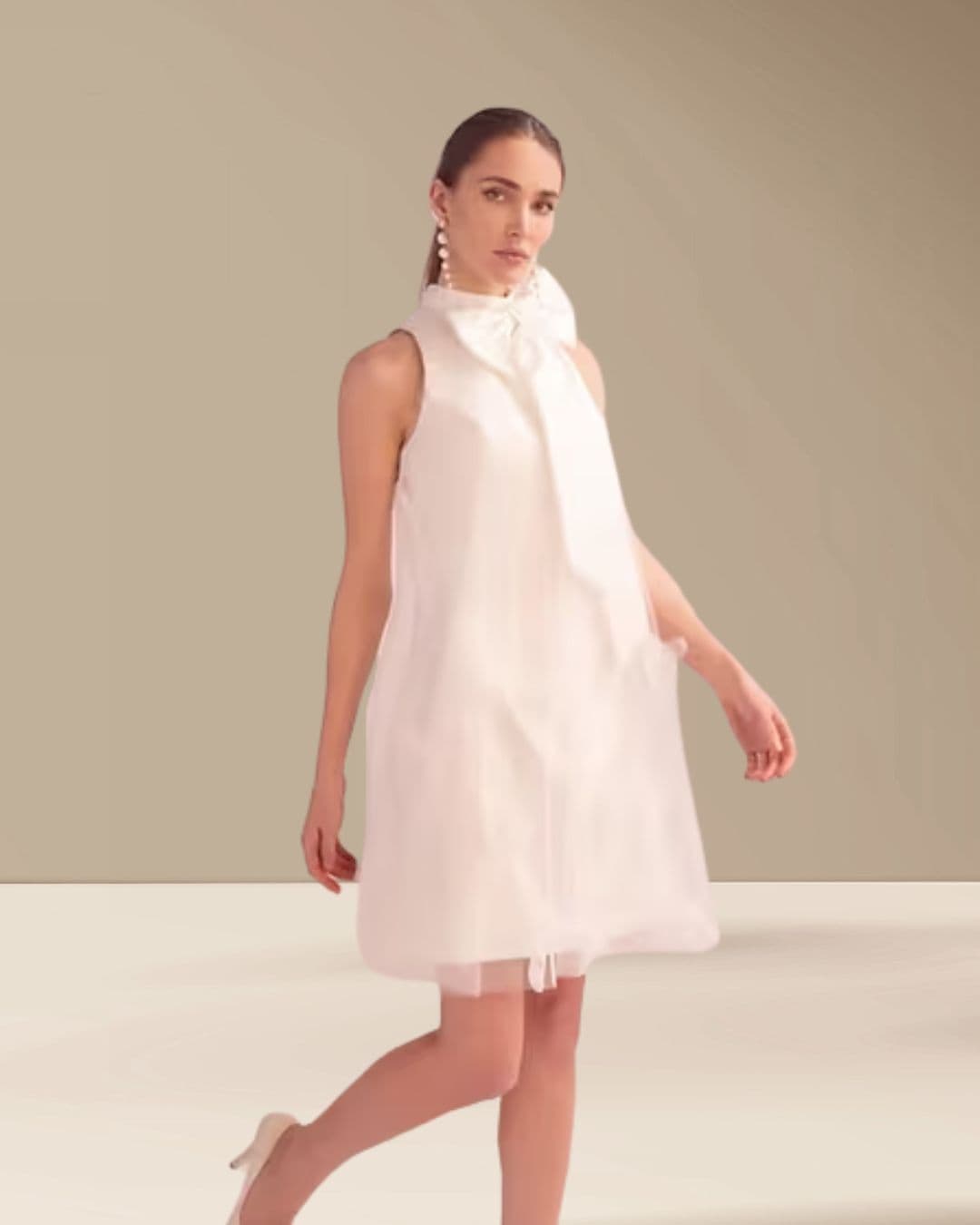 Twiggy - Chosen by TDR Atelier wedding dress by Chosen Modern, playful, and effortlessly chic, this mini wedding dr...