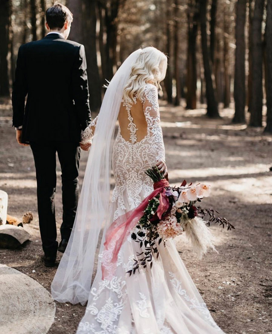 This gorgeous lace sleeved gown is the perfect boho look 